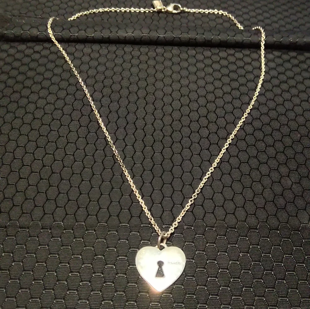 Authentic Coach Sterling Silver Heart Lock Pendant Necklace